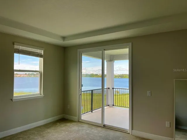 a view of an empty room and window