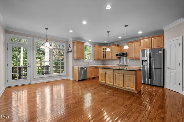 a view of entryway with wooden floor