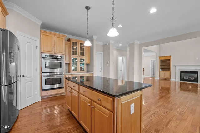 a spacious bathroom with a granite countertop tub sink and mirror