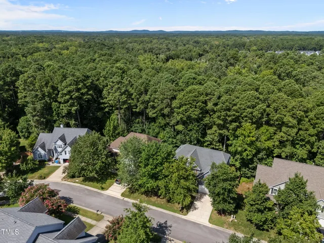 an aerial view of a city with lots of residential buildings