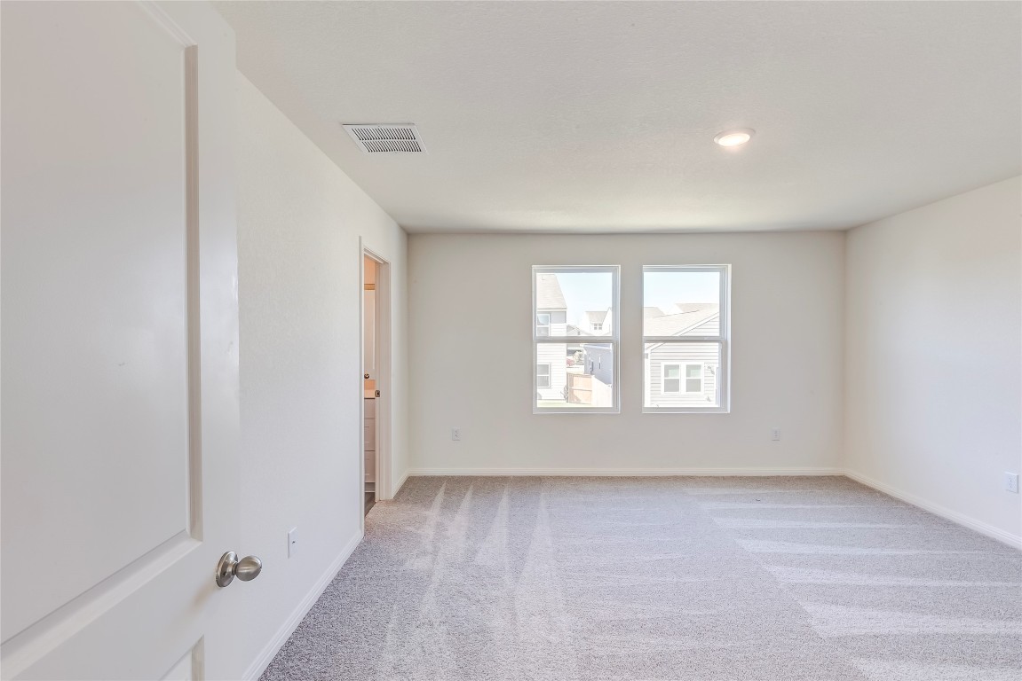 344 Enforcer Loop Jarrell, TX 76537 - Photo 20 of 34 a view of an empty room with a window