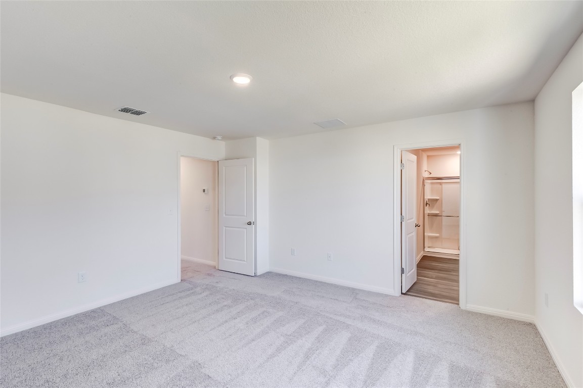 344 Enforcer Loop Jarrell, TX 76537 - Photo 22 of 34 a view of an empty room