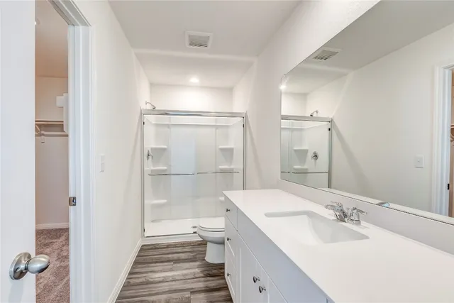 a bathroom with a sink and a toilet