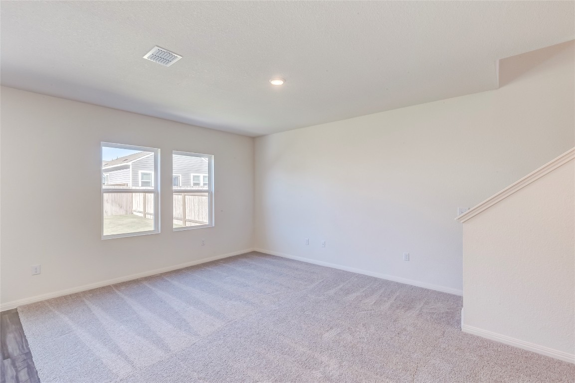 344 Enforcer Loop Jarrell, TX 76537 - Photo 8 of 34 an empty room with a window