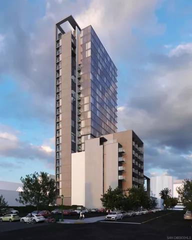 a tall building sitting on the side of a street