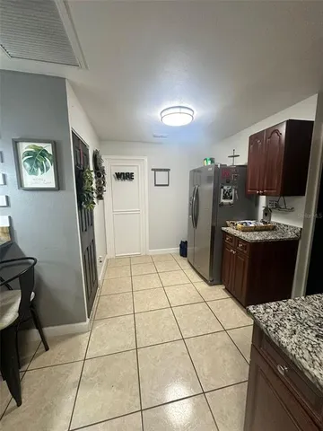 a room with a washing machine and a table