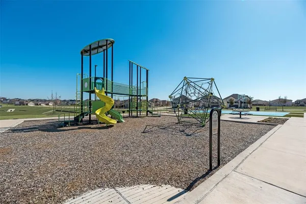 a view of a house with a park
