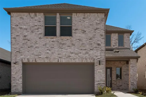 a brick house with a outdoor space