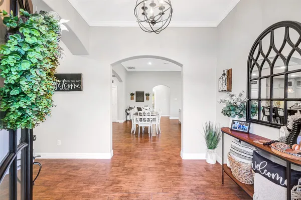 a living room with furniture fireplace and a flat screen tv