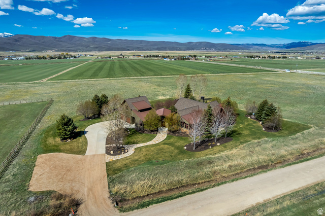 2579 Splendor Valley Road Kamas, UT 84036 - Photo 25 of 87 Aerial view of sparsely populated area featuring agricultural land and a mountainous background
