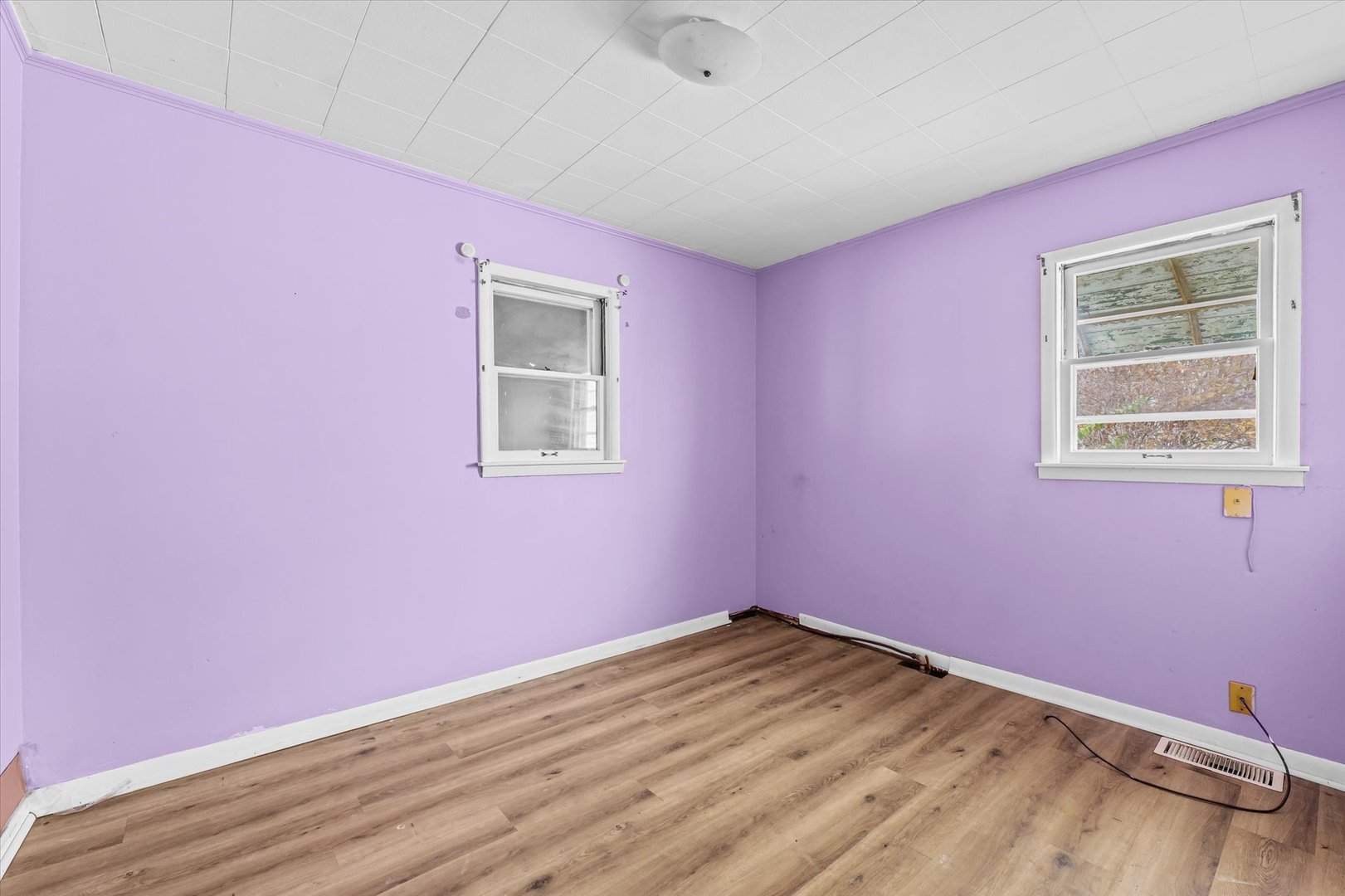 218 West Elm Street Hoopeston, IL 60942 - Photo 17 of 25 a view of empty room with wooden floor and fan