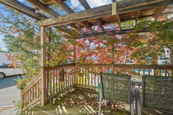 a view of a chairs and table in the patio