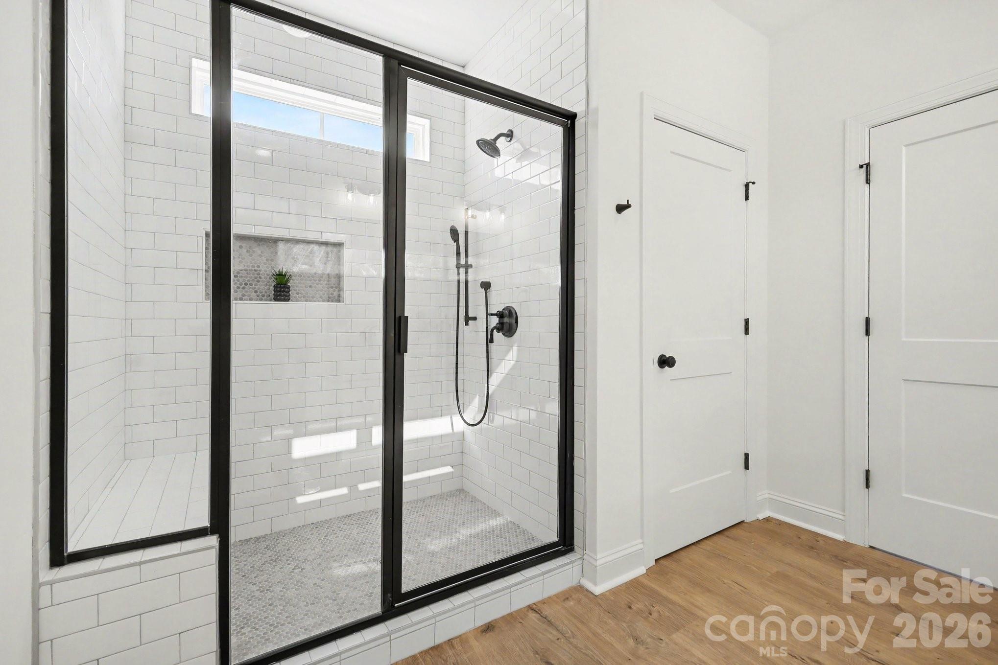 190 Goodnight Road Salisbury, NC 28147 - Photo 29 of 35 a view of a bathroom with a glass door