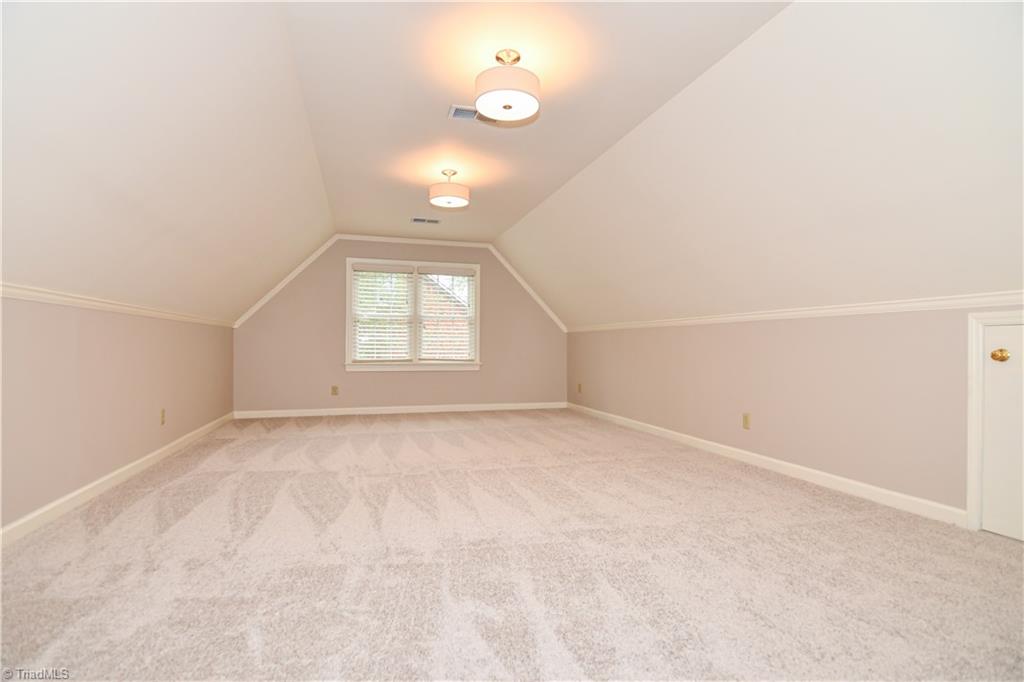 3902 Rockingham Road South Greensboro, NC 27407 - Photo 22 of 29 As if there wasn't enough space already, the large bonus room over the garage perfect for a game room or home theater... or another bedroom.