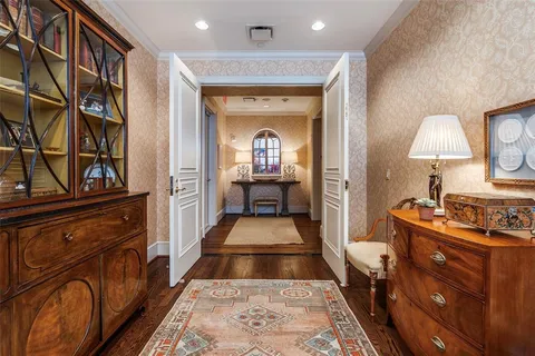 a view of a bedroom with furniture and staircase