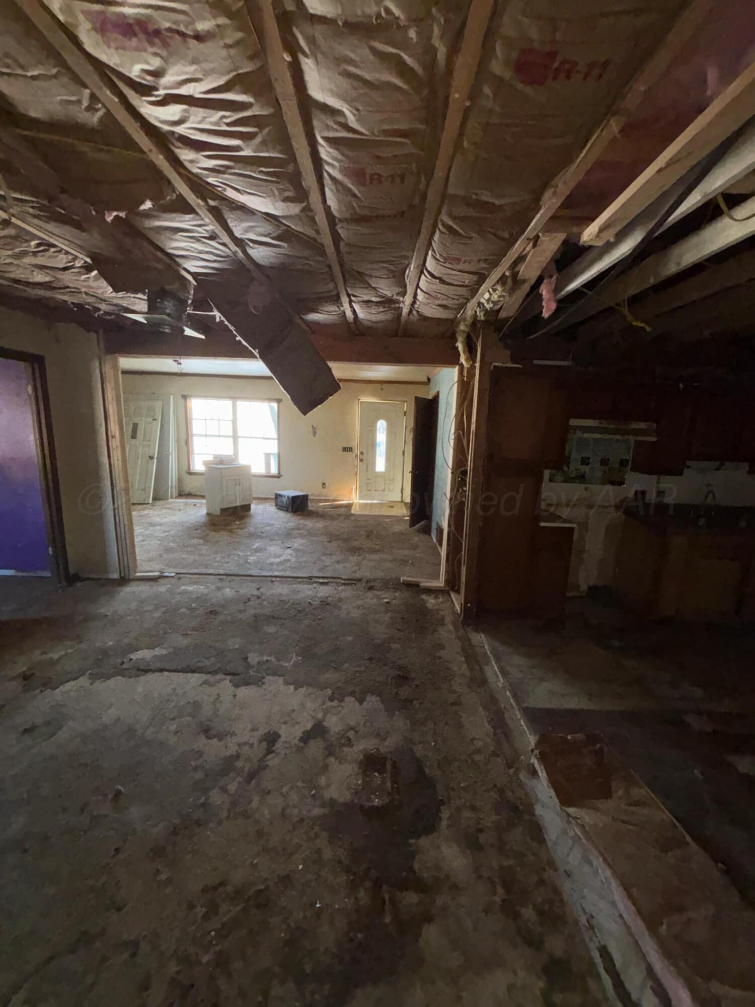 4201 Long Drive Amarillo, TX 79108 - Photo 2 of 7 a view of an empty room with wooden floor