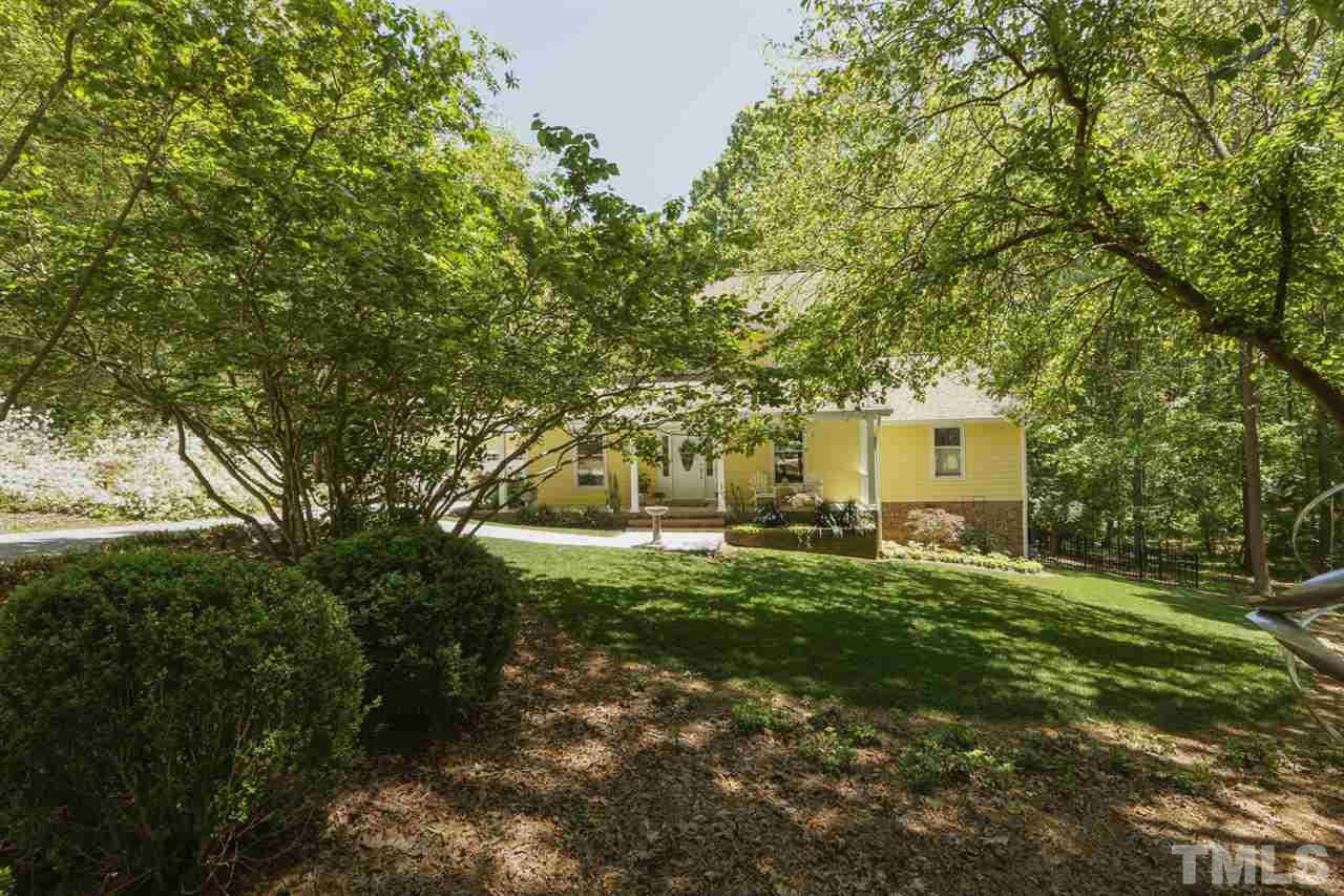 3501 Campbell Road Raleigh, NC 27606 - Photo 3 of 30 Main floor living with first floor owner suite! New exterior paint. You will love the beatuiful setting and low costs (No HOA, No City Tax and No water or sewer bill!)