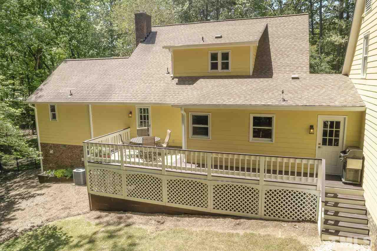 3501 Campbell Road Raleigh, NC 27606 - Photo 29 of 30 Another view of deck which stretches around the back of the home. Fenced rear yard!