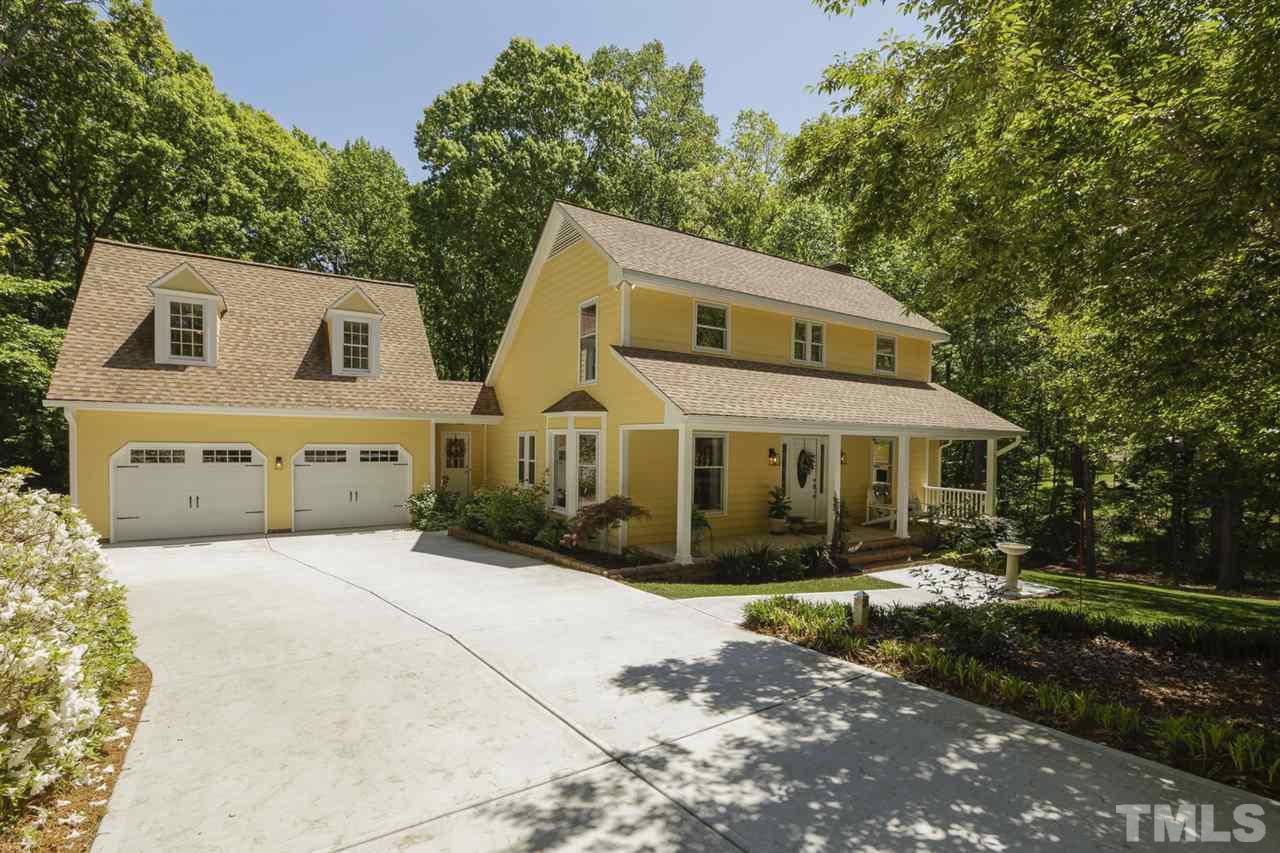 3501 Campbell Road Raleigh, NC 27606 - Photo 4 of 30 Drive into your nature paradise on new driveway with extra concrete pad.