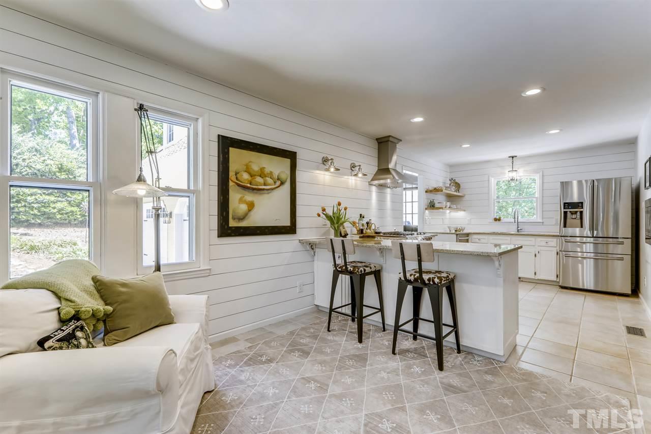 3501 Campbell Road Raleigh, NC 27606 - Photo 10 of 30 Large breakfast area open to kitchen with eat in counter