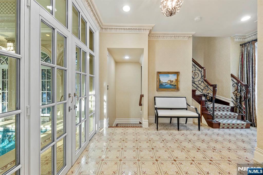 78 Roberts Road Englewood Cliffs, NJ 07632 - Photo 11 of 50 a view of a hallway with wooden floor and entryway