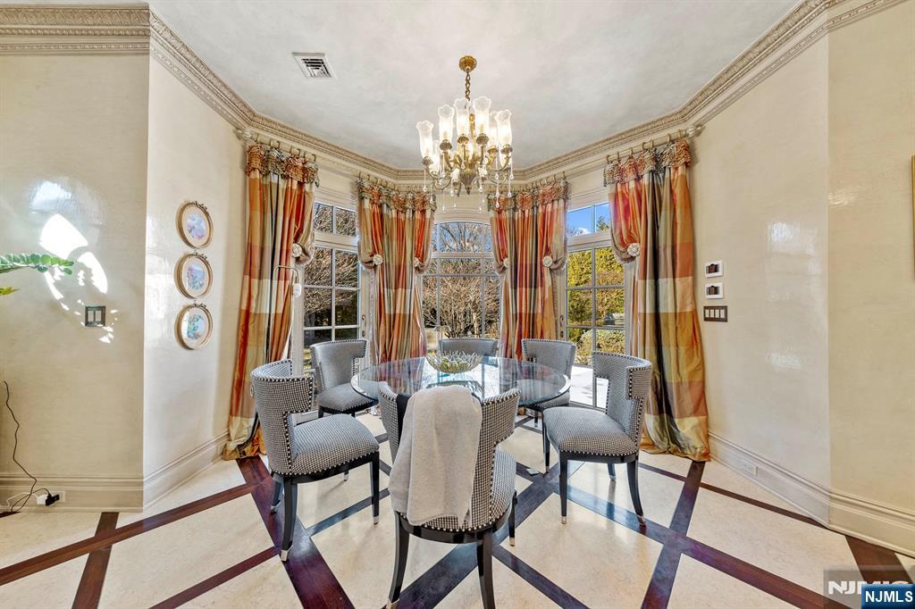 78 Roberts Road Englewood Cliffs, NJ 07632 - Photo 19 of 50 a view of a dining room with furniture window and outside view