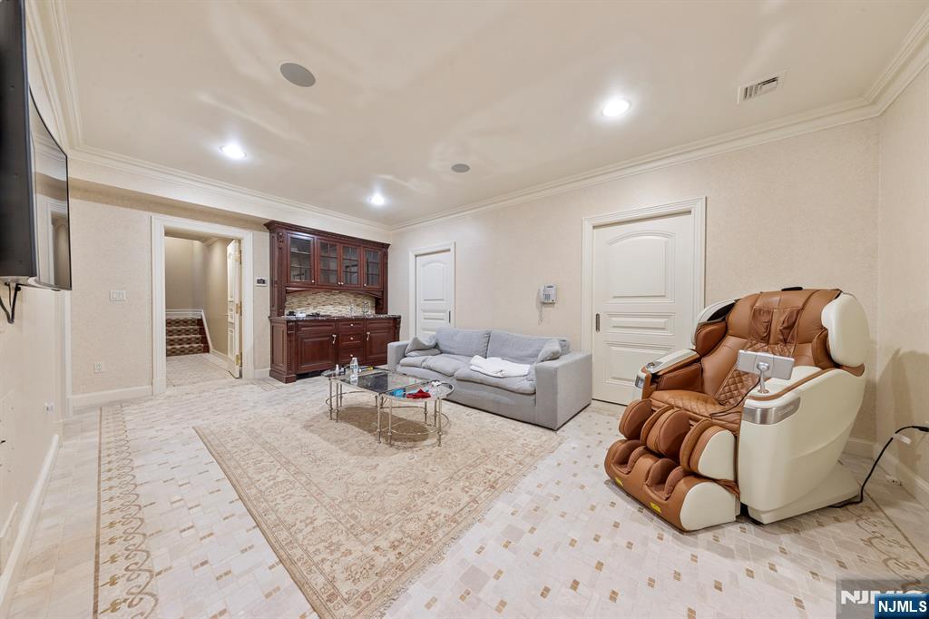 78 Roberts Road Englewood Cliffs, NJ 07632 - Photo 39 of 50 a living room with furniture and a wooden floor