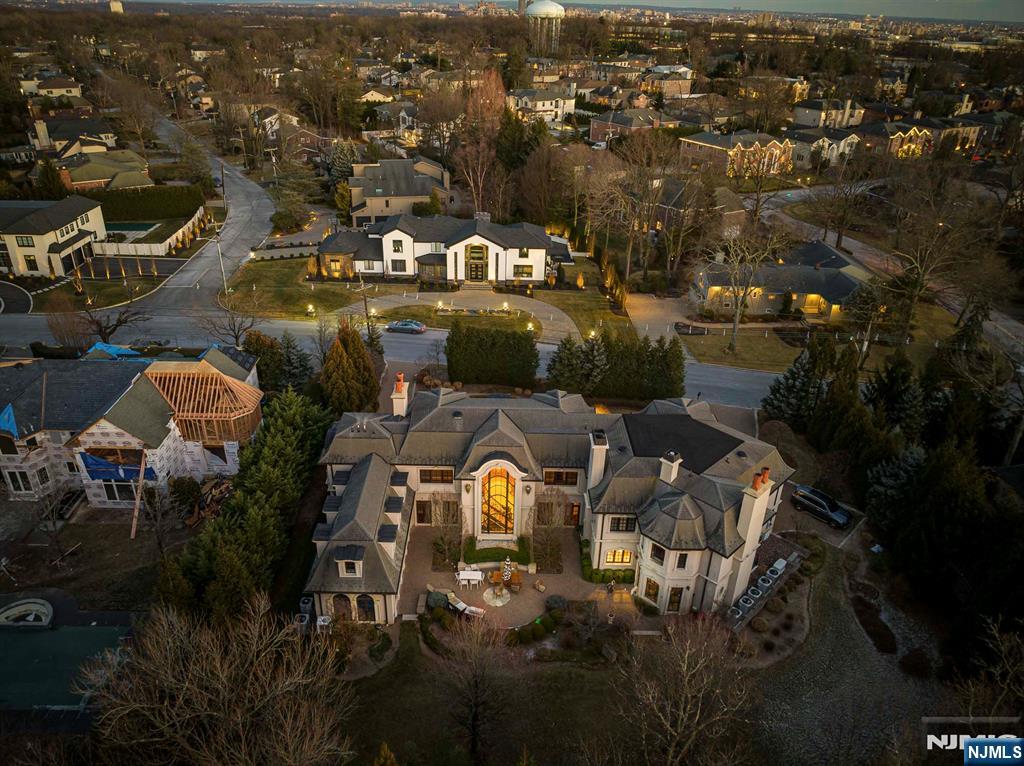 78 Roberts Road Englewood Cliffs, NJ 07632 - Photo 4 of 50 an aerial view of a house with yard swimming pool and lake view