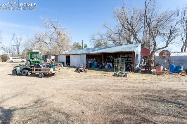 a view of a terrace with furniture and stove