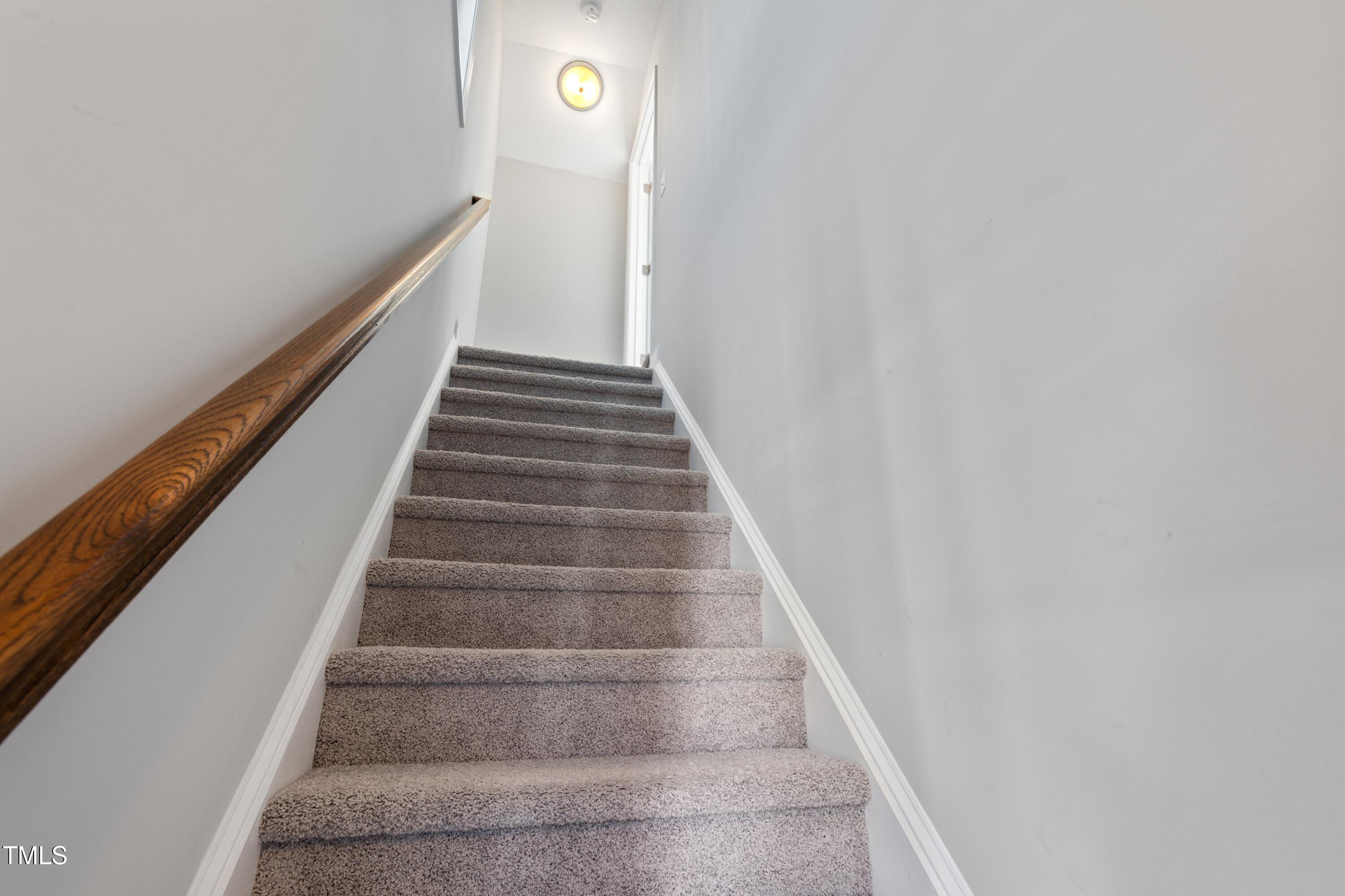 5501 Advancing Avenue Raleigh, NC 27616 - Photo 50 of 56 Stairs to Bedroom 4 over Garage
