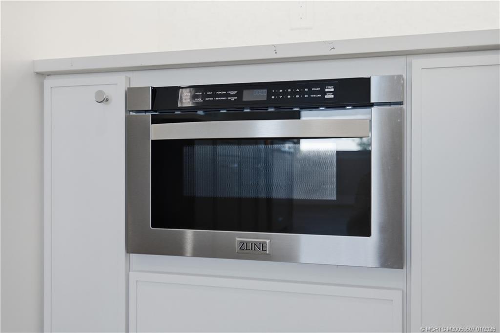 1063 Northwest 12th Terrace Stuart, FL 34994 - Photo 17 of 42 a close view of cabinet