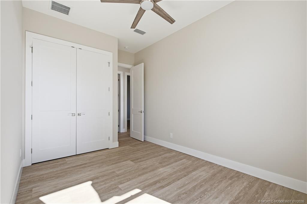 1063 Northwest 12th Terrace Stuart, FL 34994 - Photo 30 of 42 a view of an empty room