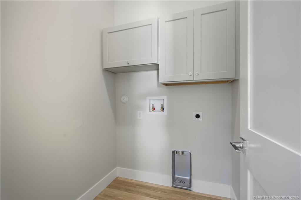 1063 Northwest 12th Terrace Stuart, FL 34994 - Photo 35 of 42 a view of small space with wooden floor