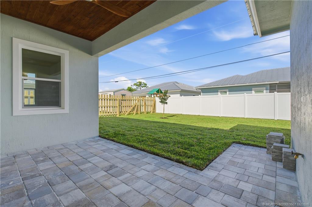 1063 Northwest 12th Terrace Stuart, FL 34994 - Photo 37 of 42 a view of a backyard with garden