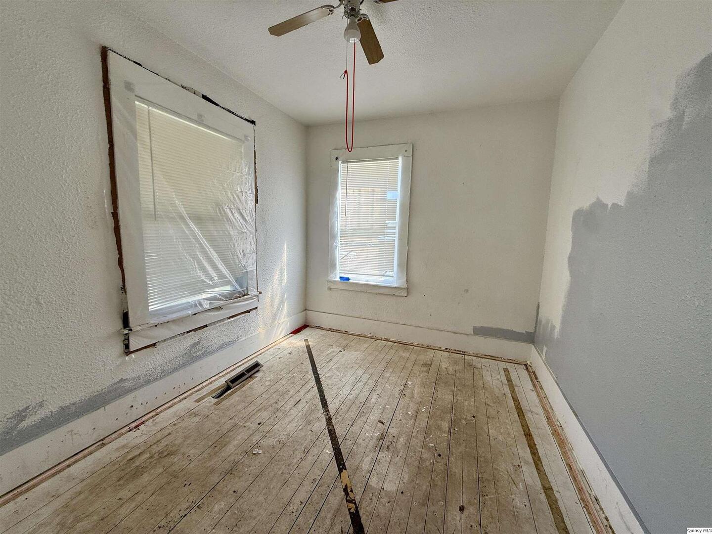 622 East Center Street Loraine, IL 62349 - Photo 15 of 21 a view of an empty room with a window