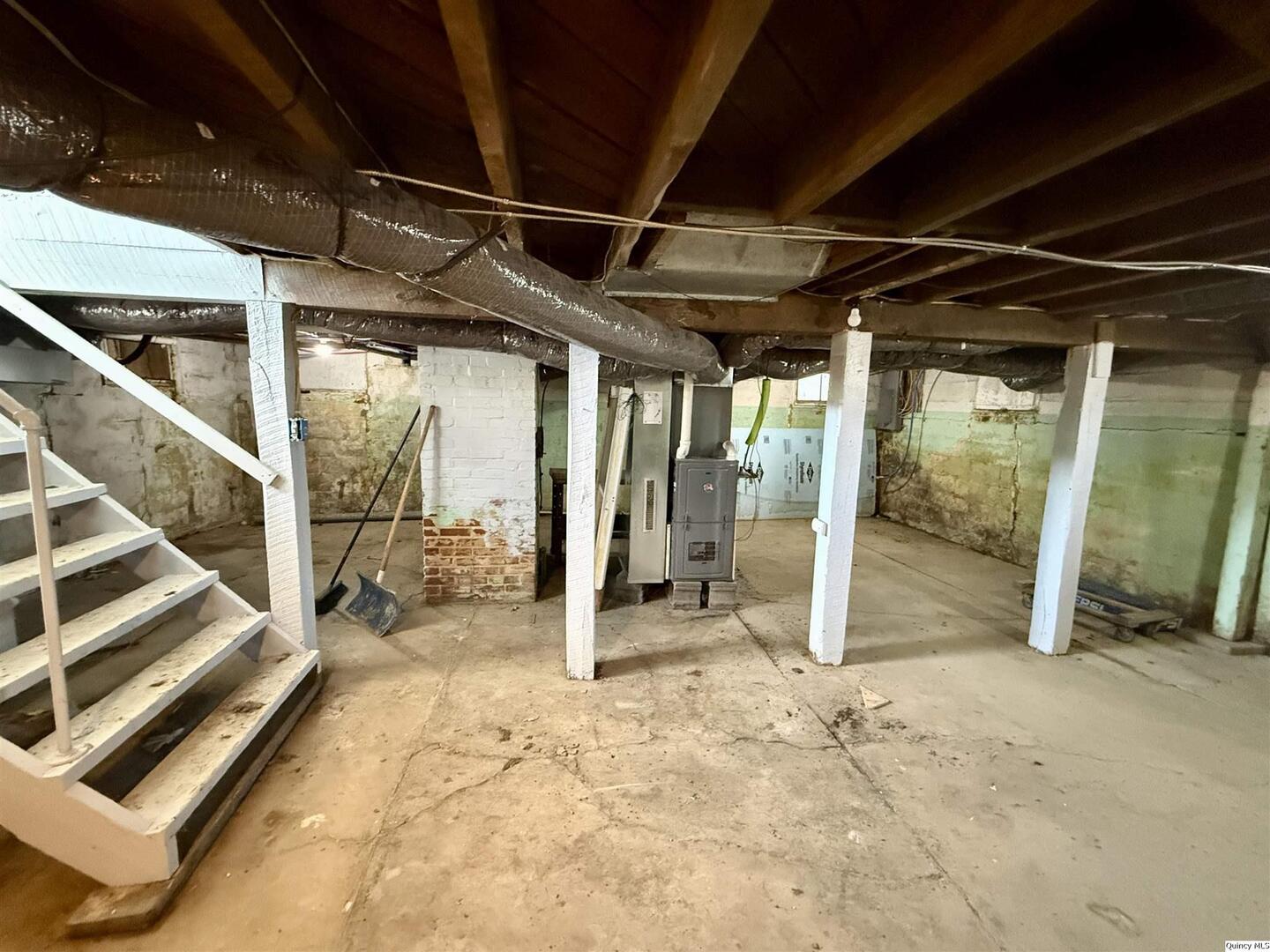 622 East Center Street Loraine, IL 62349 - Photo 6 of 21 a view of an empty room with wooden floor