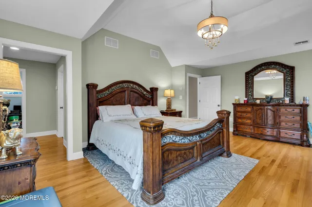 a view of yard with swimming pool and green space