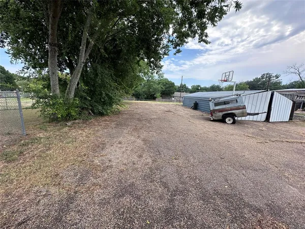a view of outdoor space with truck parked