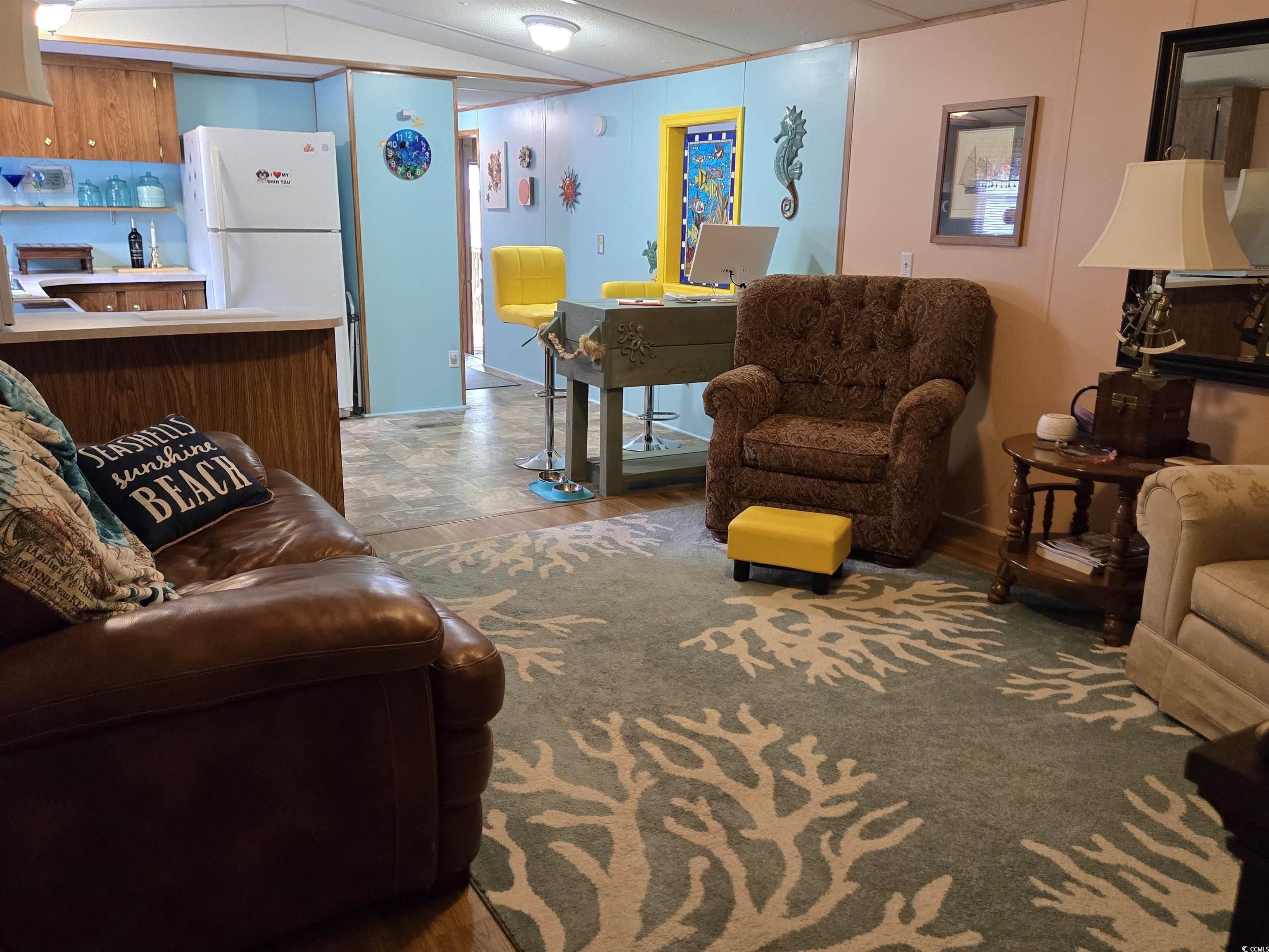 348 Bridge Street Murrells Inlet, SC 29576 - Photo 15 of 28 Living room with baseboards