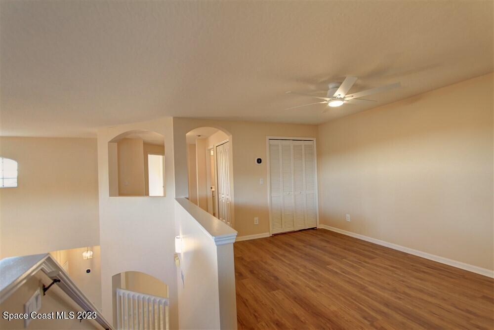 264 Intrepid Way Indialantic, FL 32903 - Photo 18 of 36 a view of entryway with wooden floor