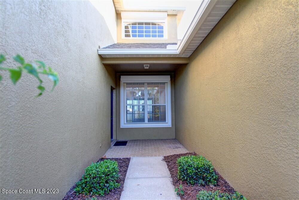 264 Intrepid Way Indialantic, FL 32903 - Photo 3 of 36 a view of entryway with garden