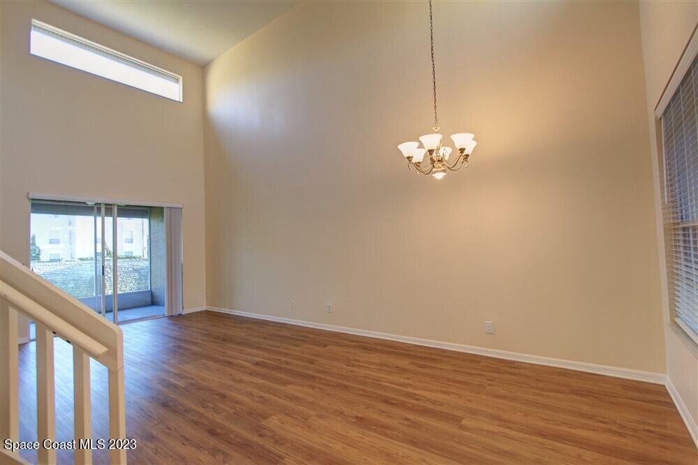 264 Intrepid Way Indialantic, FL 32903 - Photo 32 of 36 a view of a livingroom with wooden floor