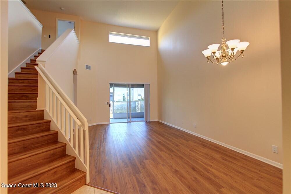264 Intrepid Way Indialantic, FL 32903 - Photo 7 of 36 a view of entryway with wooden floor