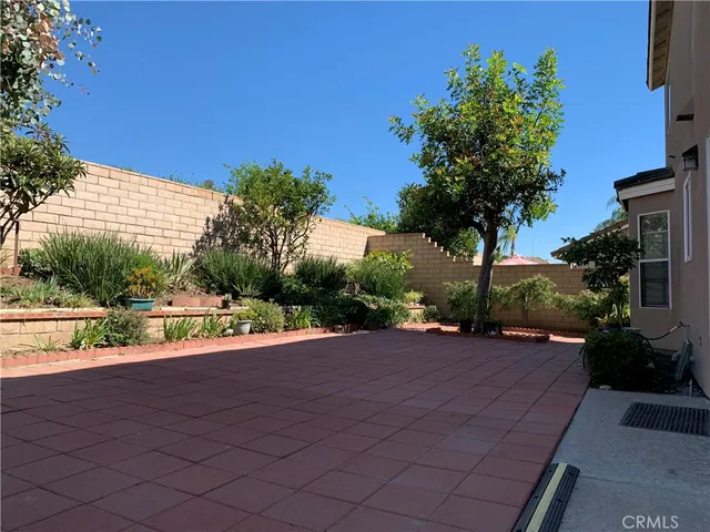 a view of swimming pool with outdoor seating