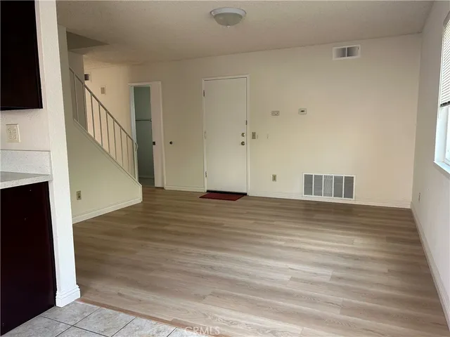 a view of a livingroom with wooden floor