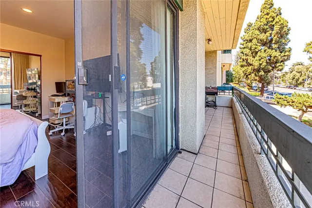 a view of an buildings with swimming pool and sitting area