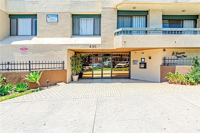 a view of a building with a street