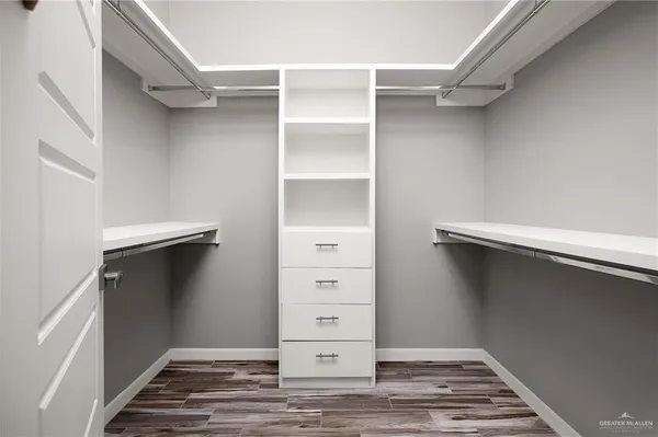 a view of an empty walk in closet