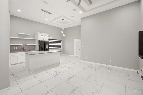 a view of kitchen with windows