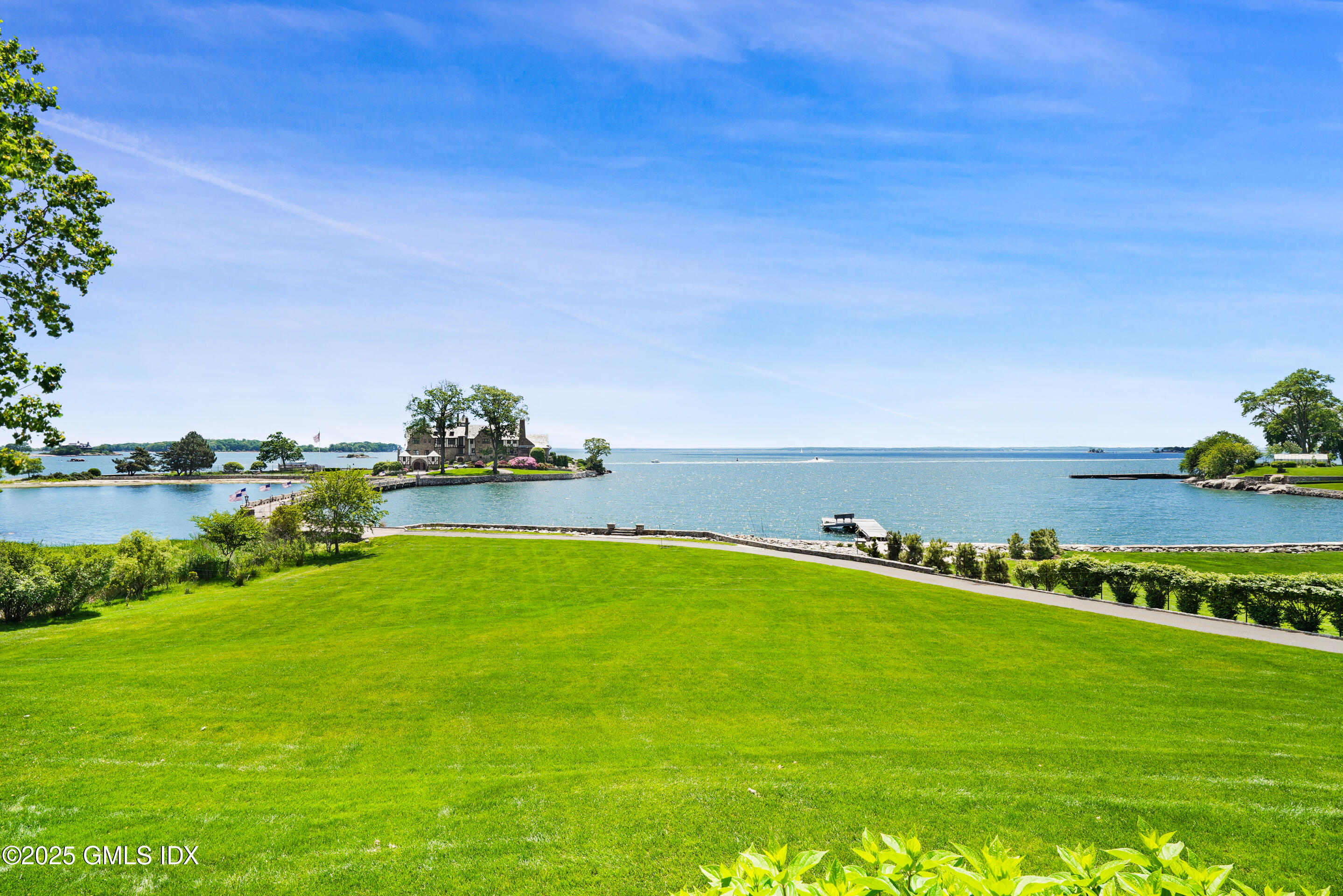 579 Indian Field Road Greenwich, CT 06830 - Photo 6 of 7 long lawn off porch